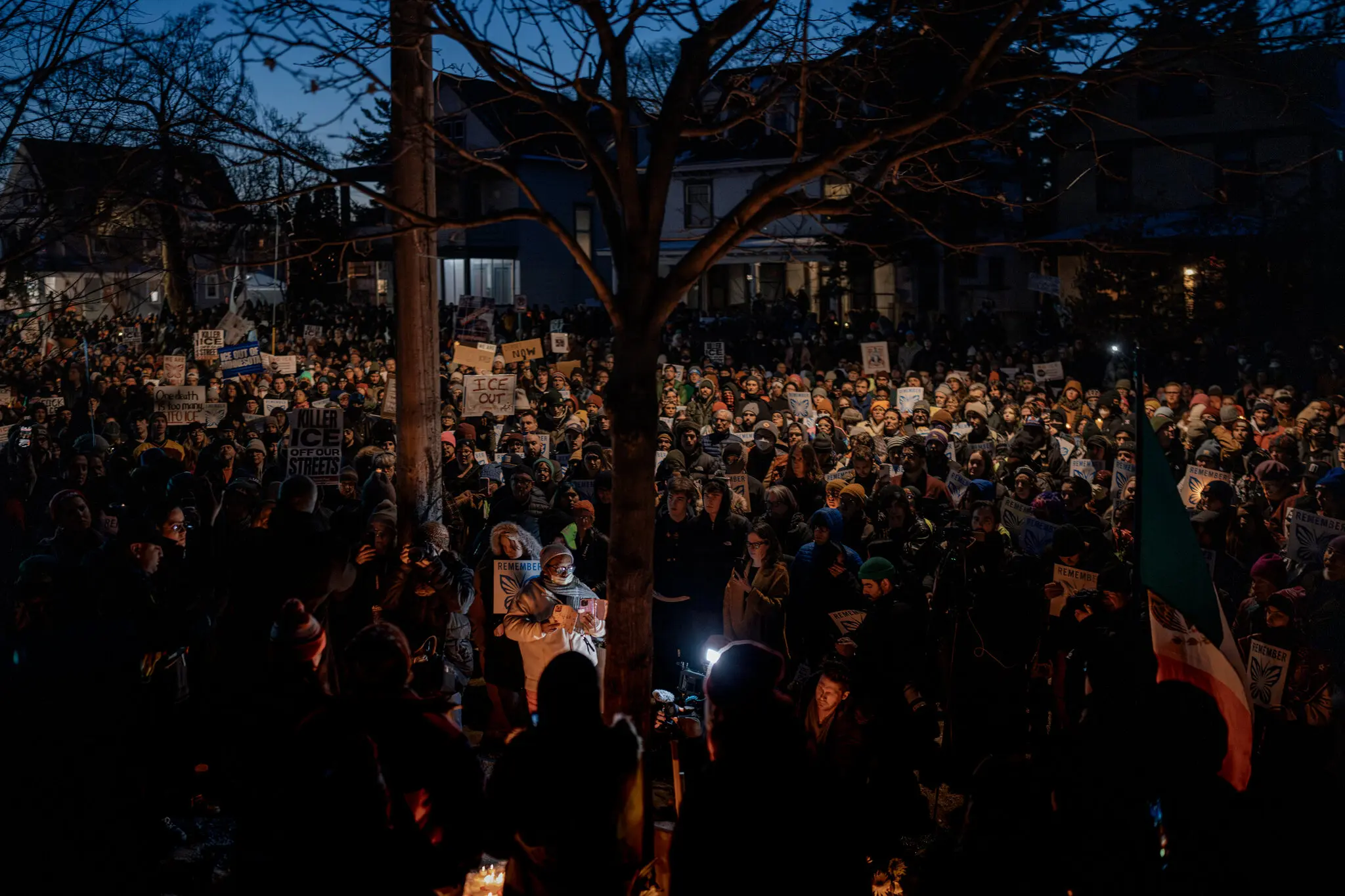 Thousands of people gathered for a vigil on the block where Renee Nicole Good, a 37-year-old woman, was killed on Wednesday in Minneapolis.