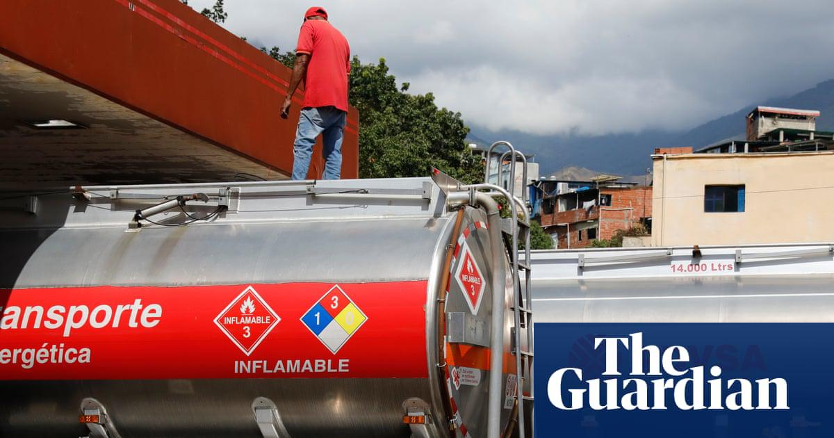 Fuel is unloaded from tankers at a petrol station in Caracas. Venezuela was a founding member of the Opec oil cartel.