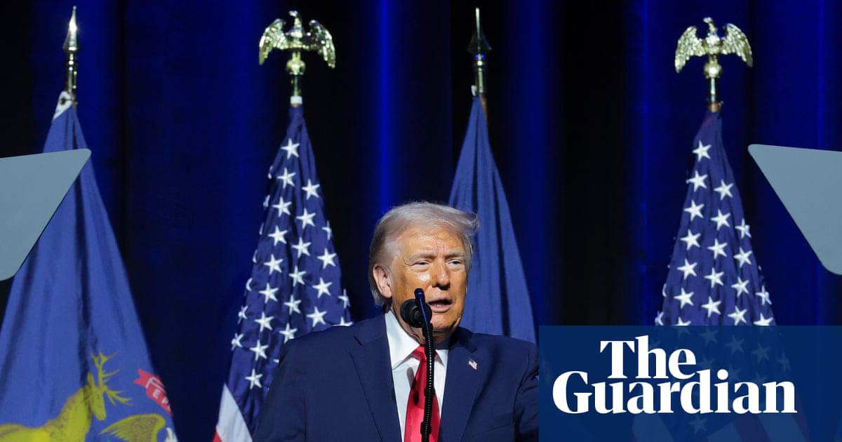 Donald Trump delivers remarks to members of the Detroit Economic Club at the MotorCity Casino Hotel in Detroit, Michigan, on Tuesday.
