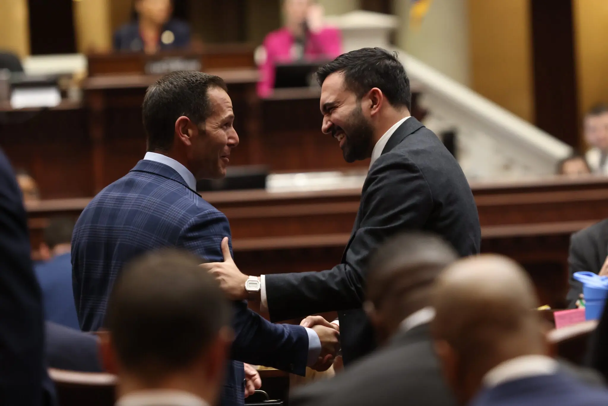 Mayor Zohran Mamdani shakes hands with a former colleague, Assemblyman Michael Durso, at the State Capitol in Albany.