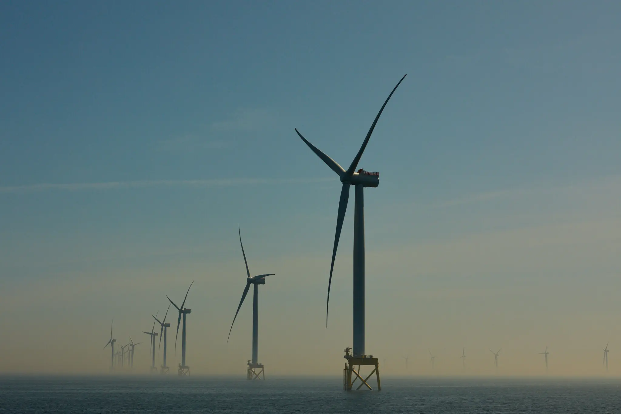 A wind turbine farm in East Anglia, England, in 2020. On Wednesday, the British government said it would provide guaranteed electricity prices for a group of wind farms off England, Scotland and Wales.