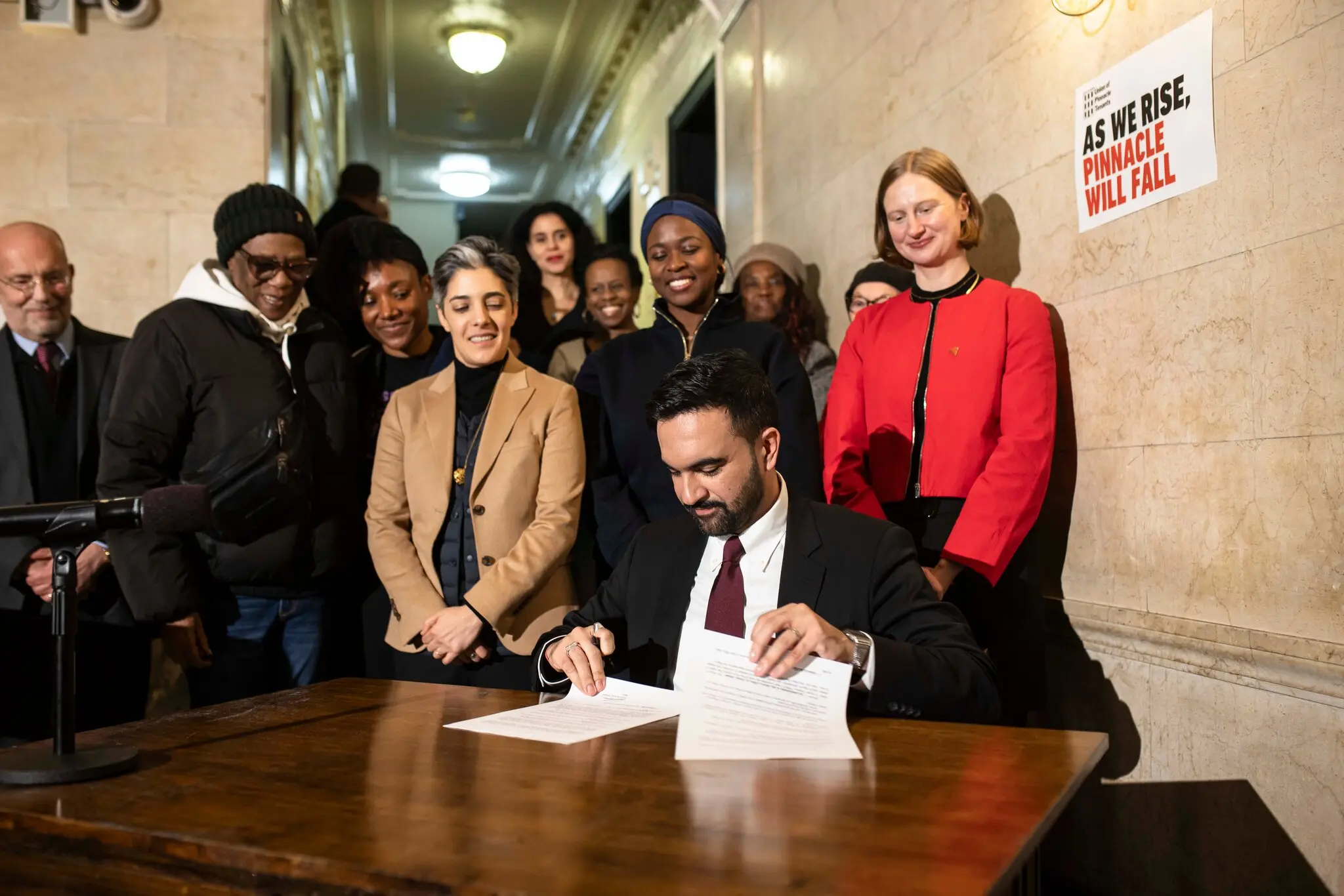 Mayor Zohran Mamdani, from a building owned by the Pinnacle Group, signed a series of executive orders to protect tenants on his first day in office.