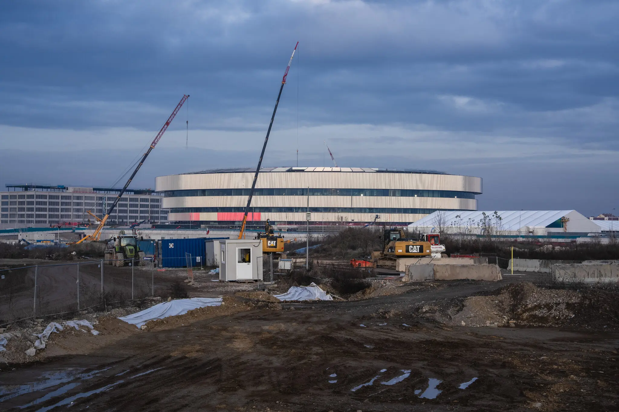 Construction surrounding the unfinished Santa Giulia Arena on Monday.