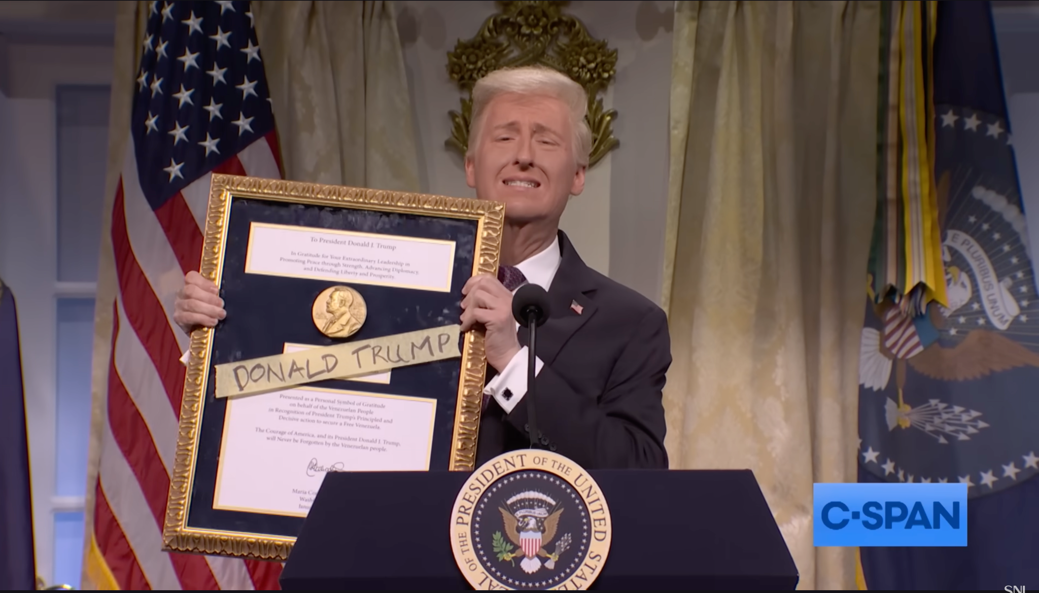 Clutching one of his Christmas wishes come true, “someone else’s Nobel Prize,” is James Austin Johnson as President Trump on “Saturday Night Live.”