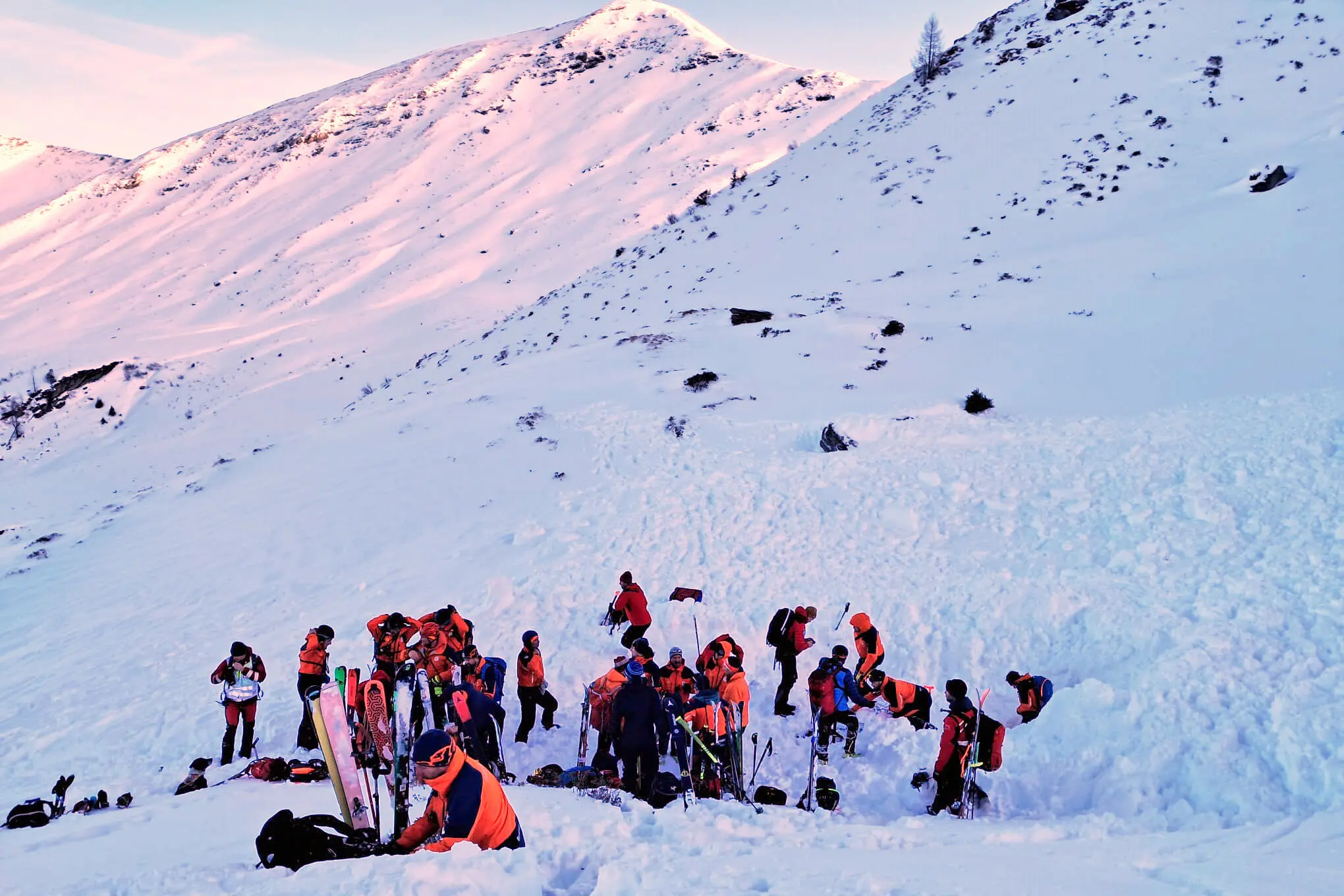A photo provided by the mountain rescue service in the Pongau region of Austria shows rescuers searching for avalanche victims on Saturday.