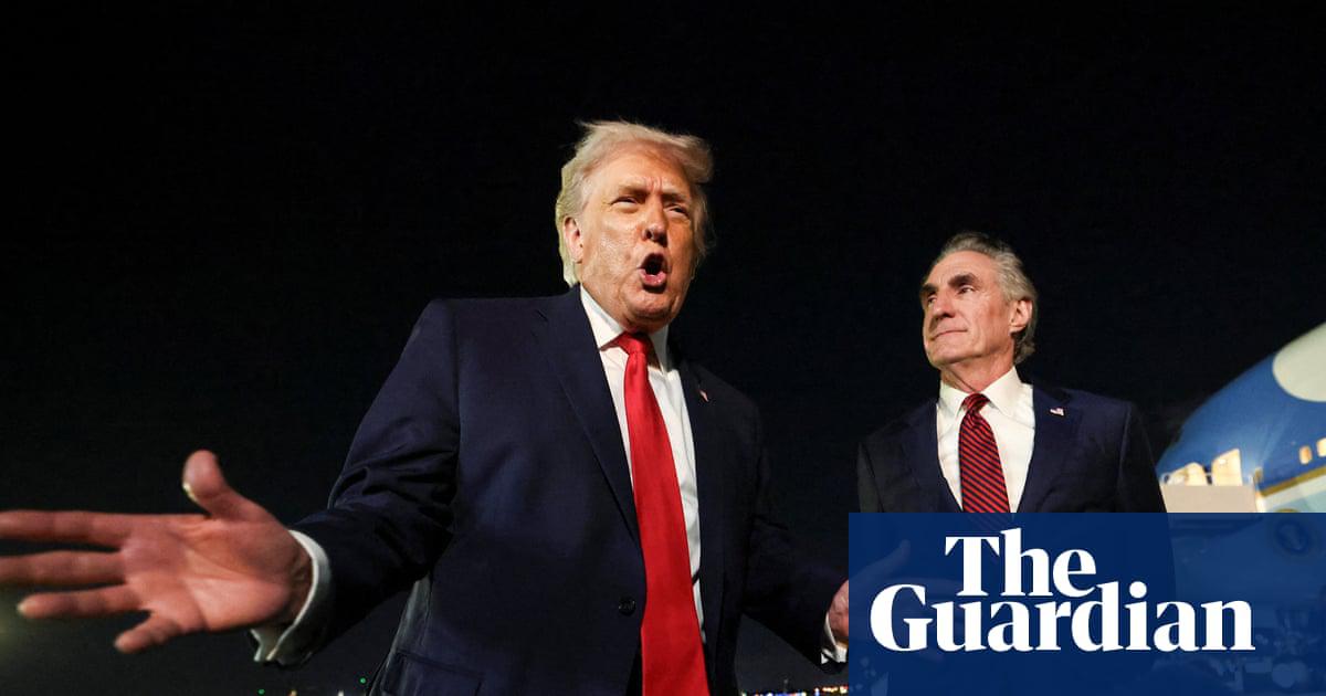Donald Trump speaks to the media before boarding Air Force One at Palm Beach, Florida. US markets were shut on Monday for Martin Luther King Jr day.