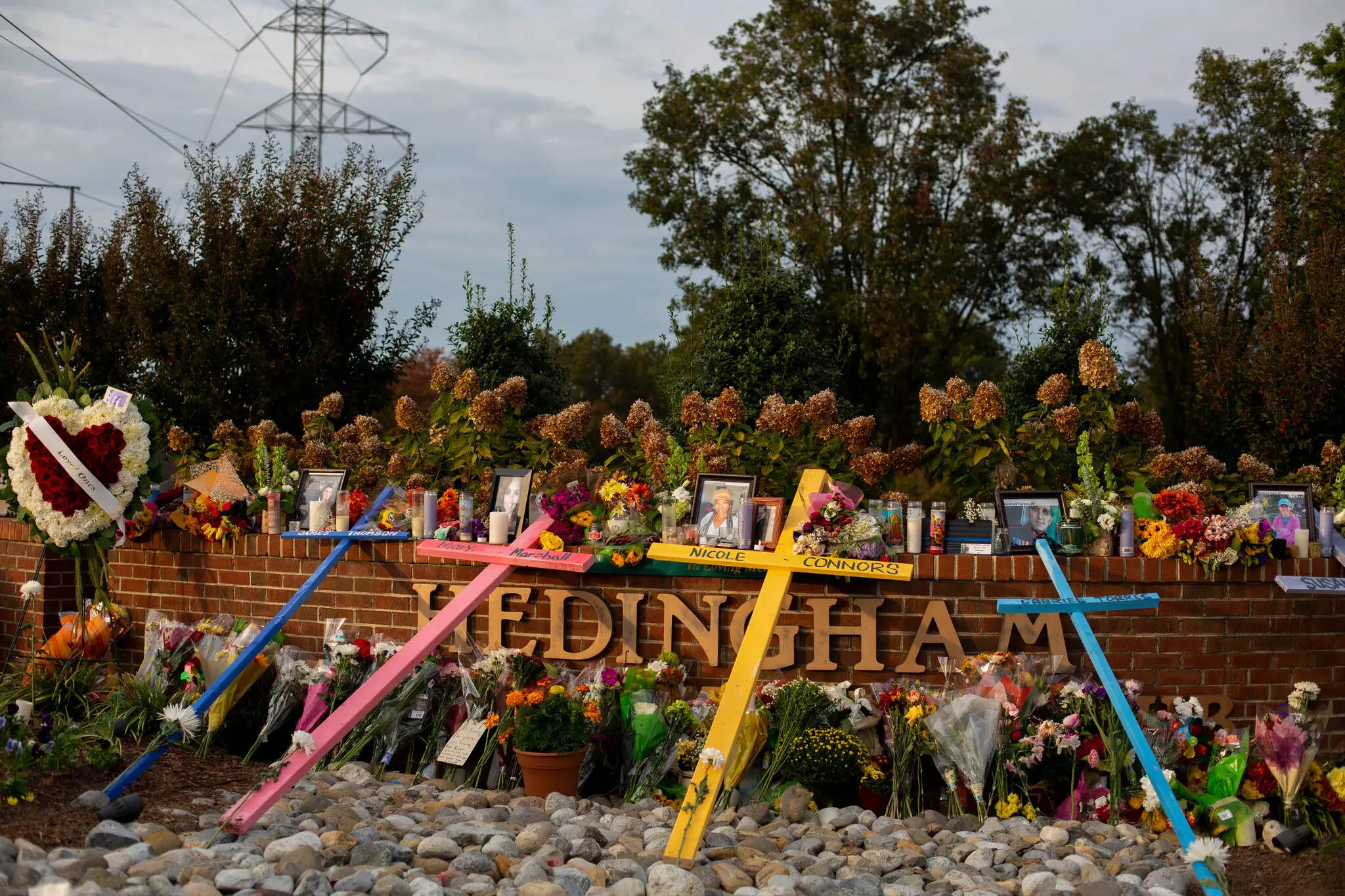 A memorial at the Hedingham Golf Club in Raleigh, N.C., in 2022, honoring the slain victims. The shooter pleaded guilty on Wednesday to all the charges against him.