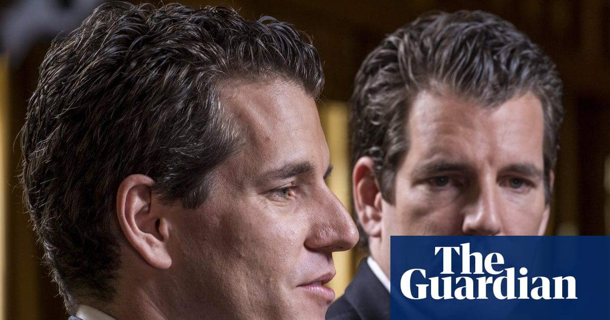 Cameron Winklevoss, CEO and co-founder of Gemini Trust Company LLC, left, speaks as Tyler Winklevoss, CFO and co-founder of Gemini Trust Company LLC, listens during an interview during a conference in Las Vegas, Nevada, on 12 May 2016.
