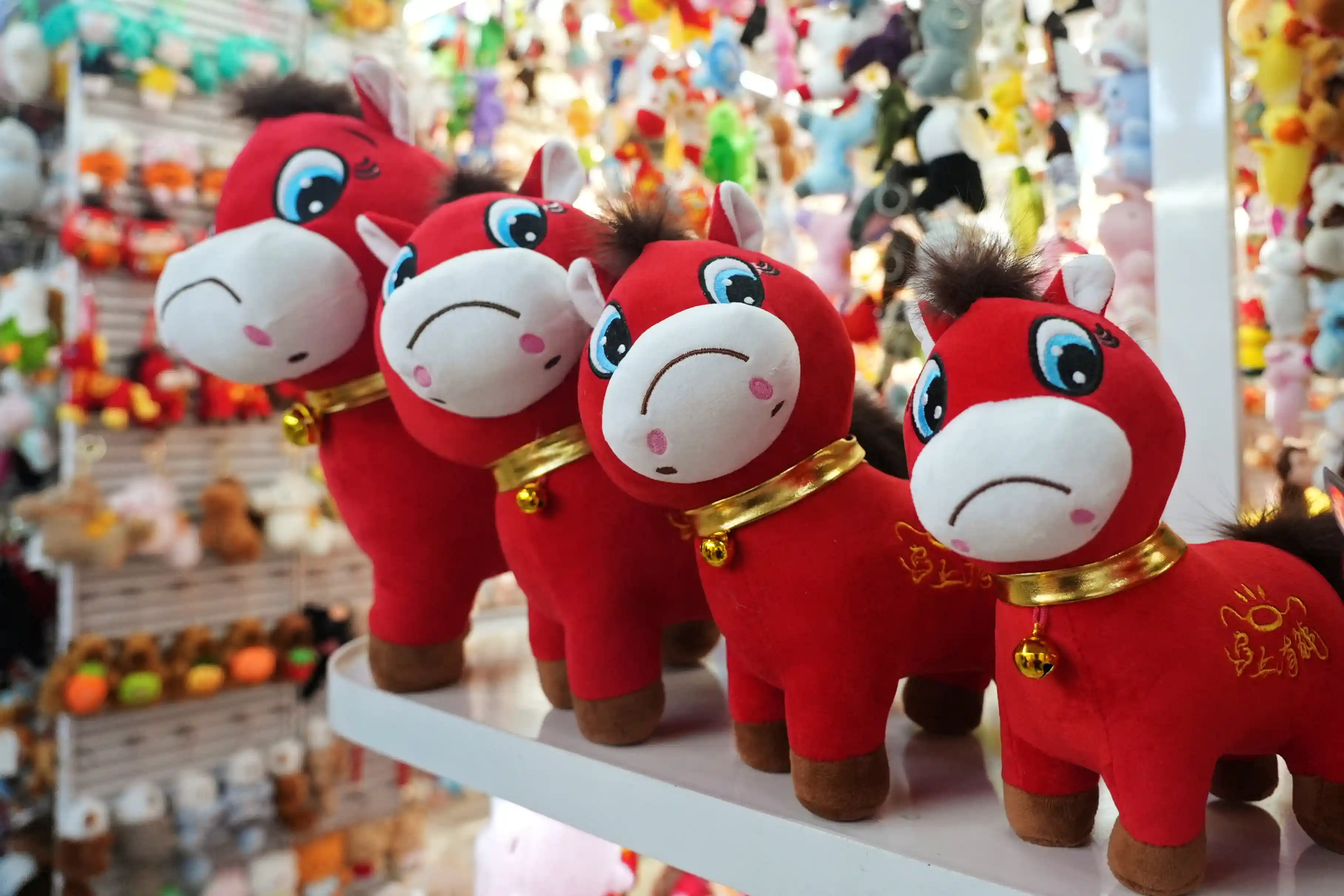 A frowny-faced horse plushie, the result of a factory mistake, has become the internet’s unofficial mascot for the Lunar New Year. Fans say it resonates with overworked office employees.