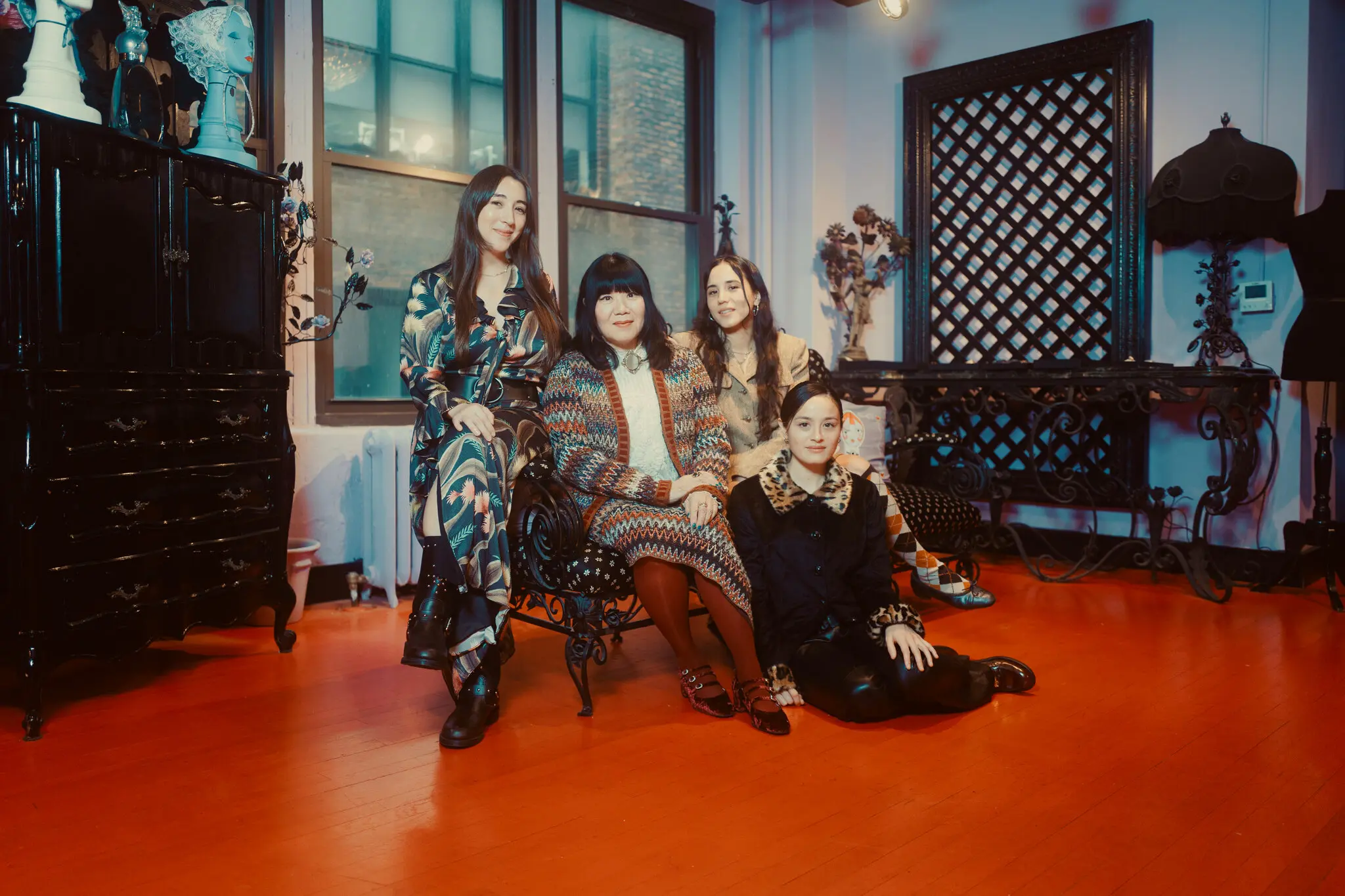 Anna Sui, center, with her nieces, from left, Isabelle Sui, Jeannie Sui Wonders and Chase Sui Wonders.