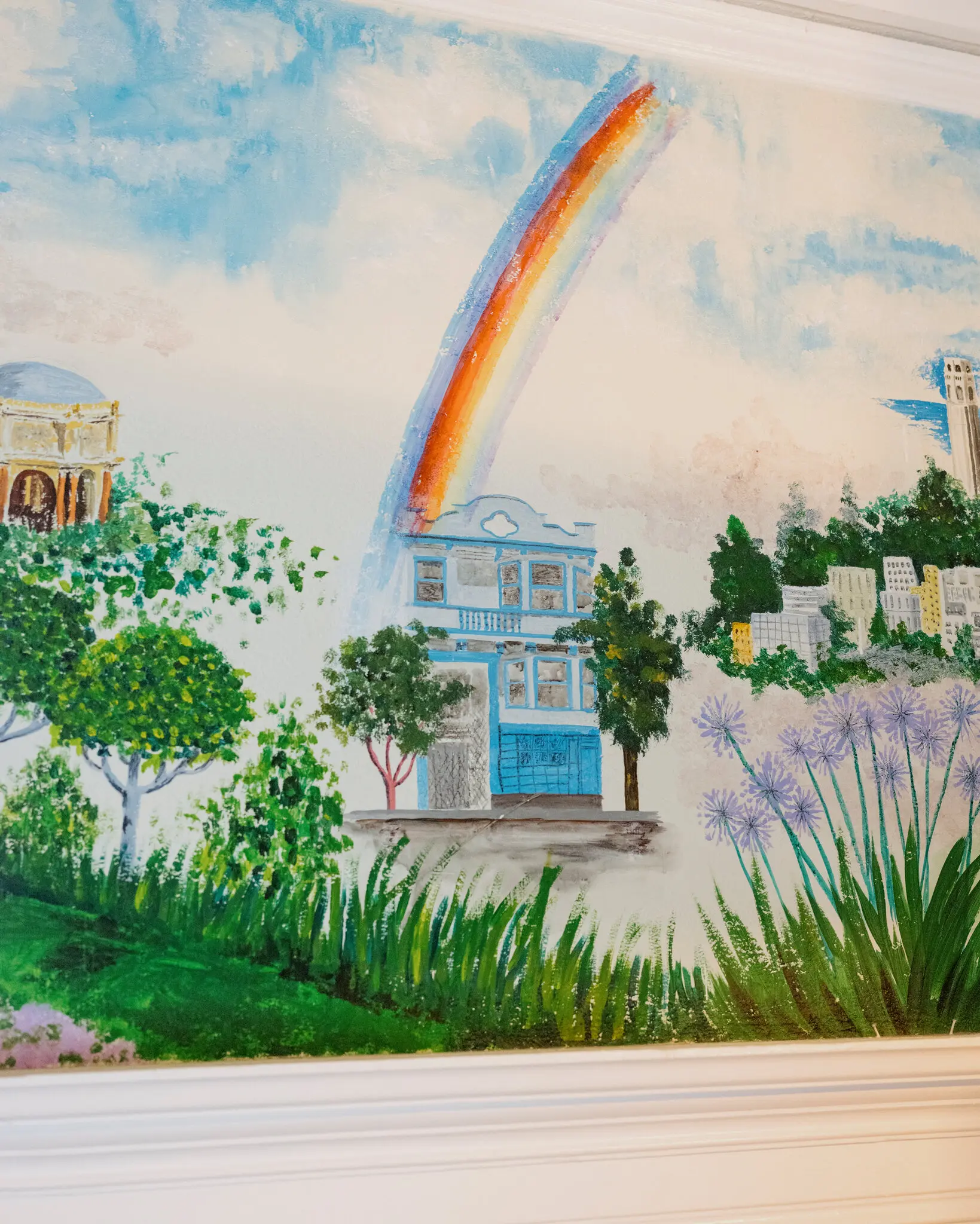 Inside a duplex that has been donated to a trust helping artists afford housing in the Bay Area. A muralist, Juancarlos Sagastume, painted the wall in 2005.