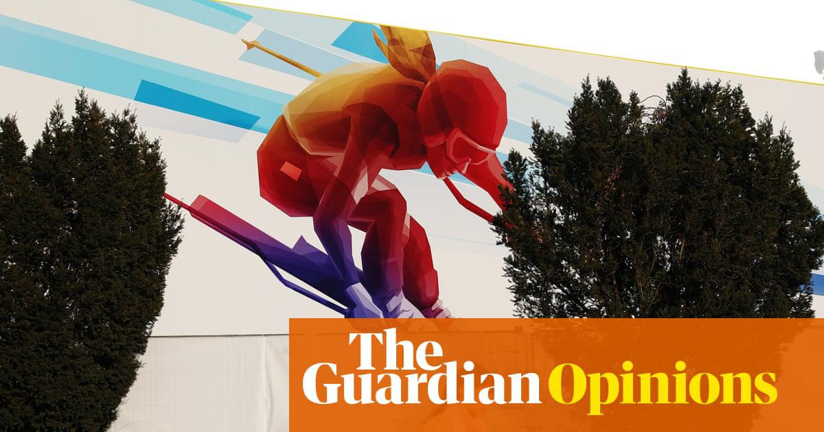 A child runs past artwork featuring an alpine ski athlete at Sforzesco Castle on 1 February 2026.