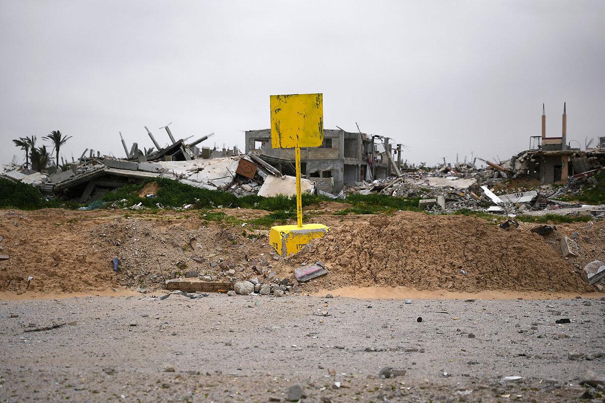 A yellow cement block marks the so-called Yellow Line, which has separated the Gaza Strip's Israeli-held and Palestinian zones since the October ceasefire, in Khan Yunis, southern Gaza Strip, Jan. 22, 2026.