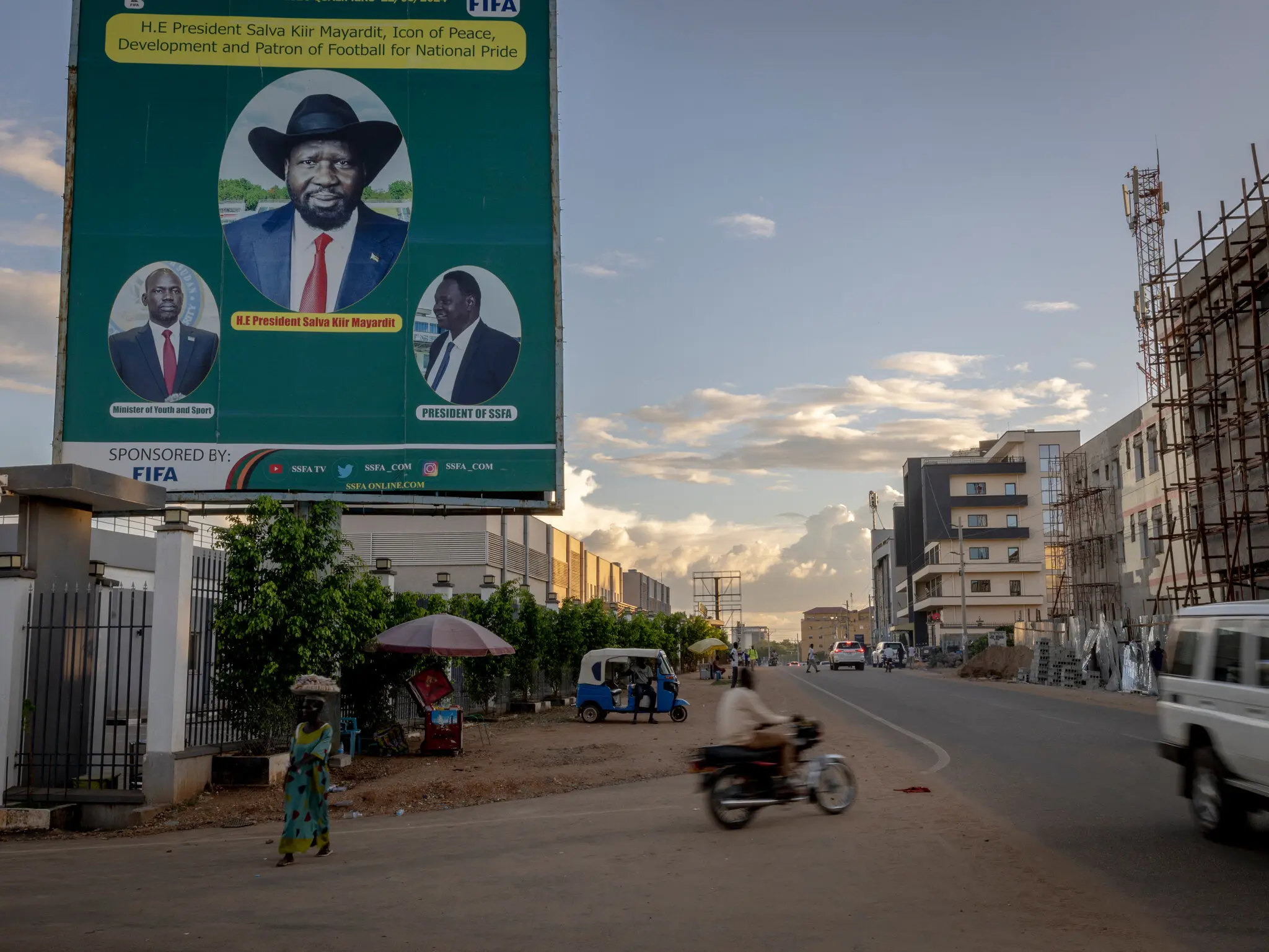 Critics accuse the government of President Salva Kiir, seen at center on a billboard in Juba, South Sudan, in 2024, of gross incompetence.