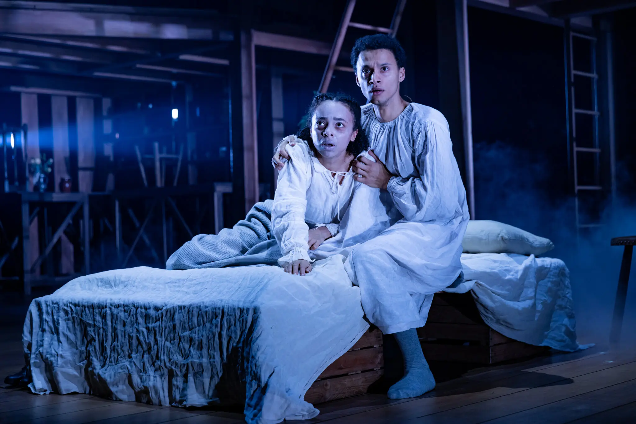 Saffron Dey and Ajani Cabey in the Royal Shakespeare Company’s “Hamnet,” whose North American tour this winter and spring will take it to Chicago, Washington and San Francisco.
